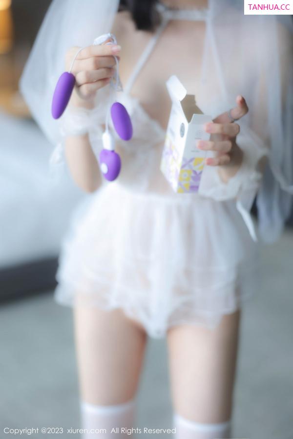   [XiuRen]高清写真图 2023.07.31 No.7165 幼幼 婚纱丝袜第17张图片